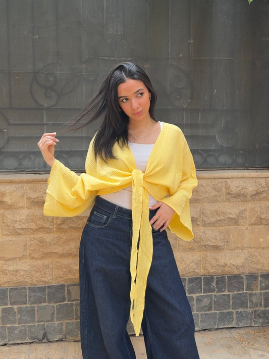 Ocean Breeze Cardigan – soft yellow textured tie-front cardigan with flowy wide sleeves, for a fresh effortless summer look.